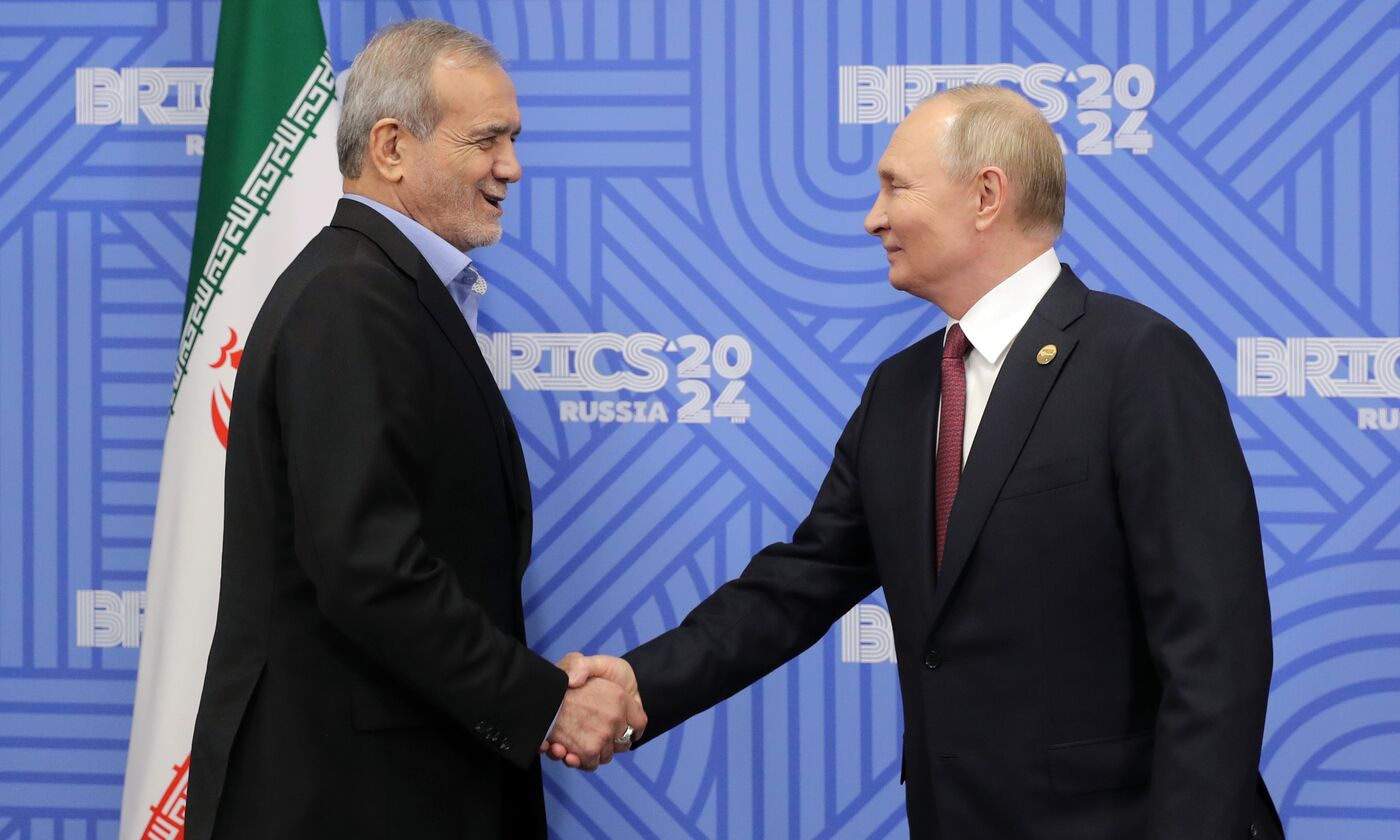 16th BRICS Summit. President of Russia Vladimir Putin meets with President of Iran Masoud Pezeshkian