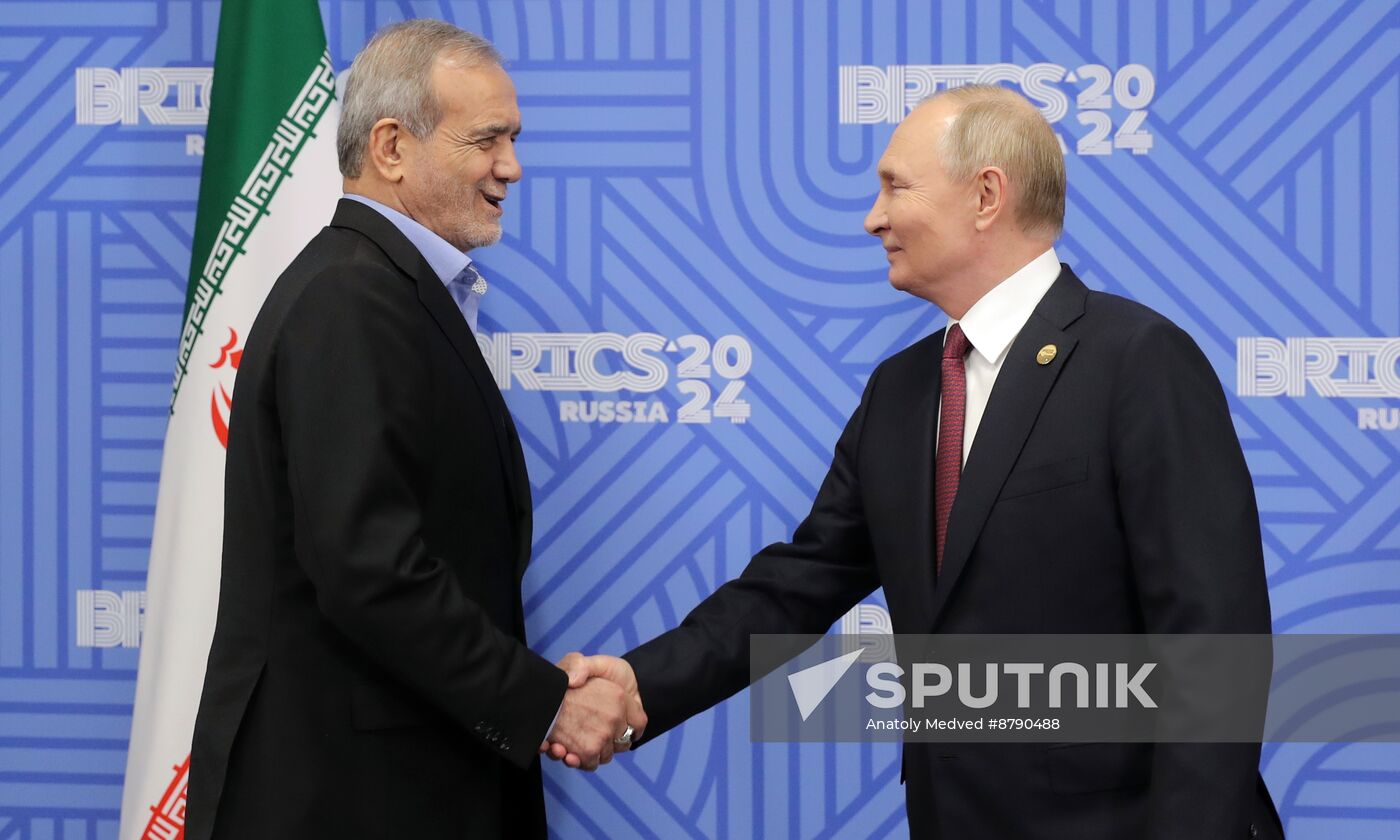 16th BRICS Summit. President of Russia Vladimir Putin meets with President of Iran Masoud Pezeshkian