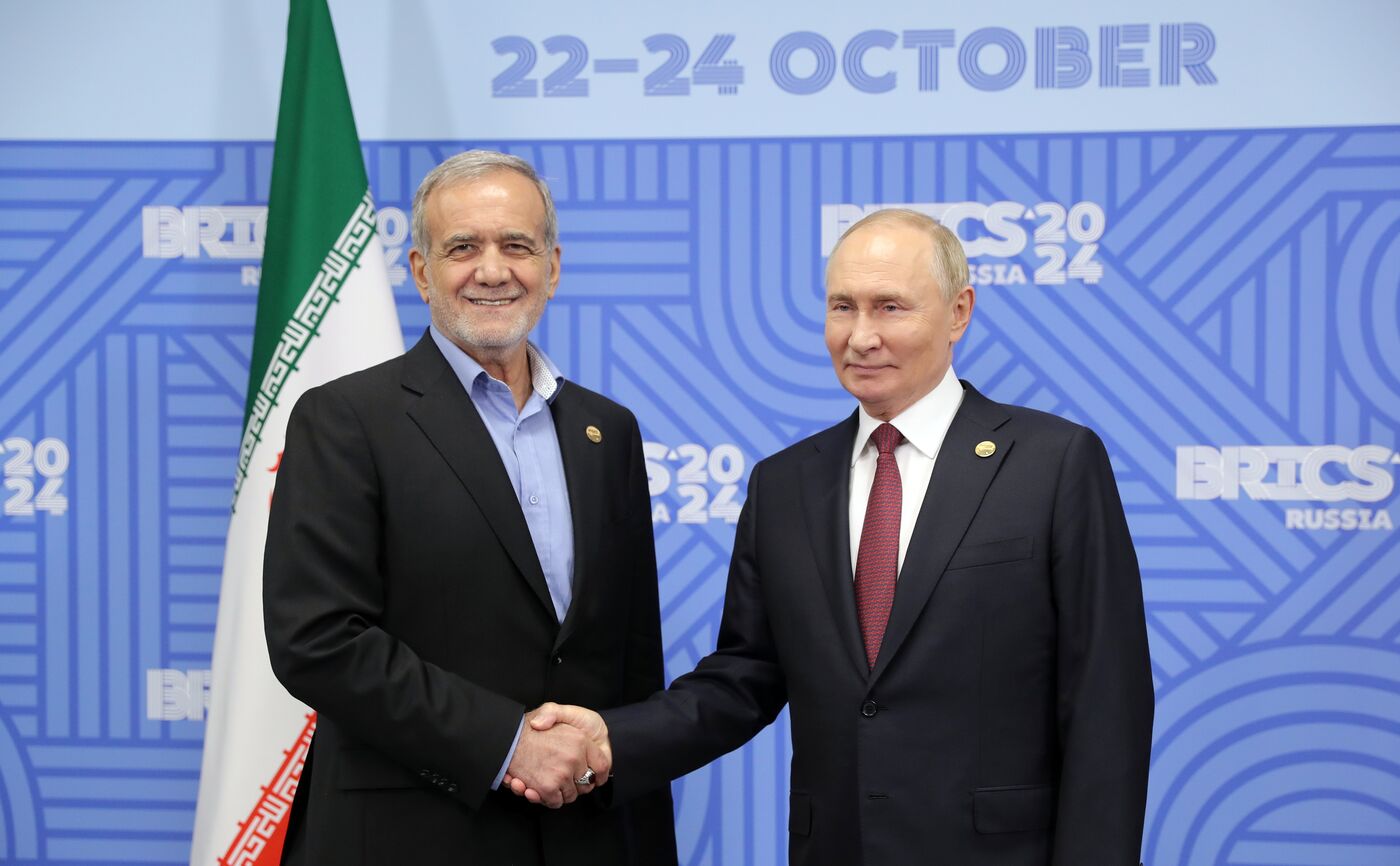 16th BRICS Summit. President of Russia Vladimir Putin meets with President of Iran Masoud Pezeshkian