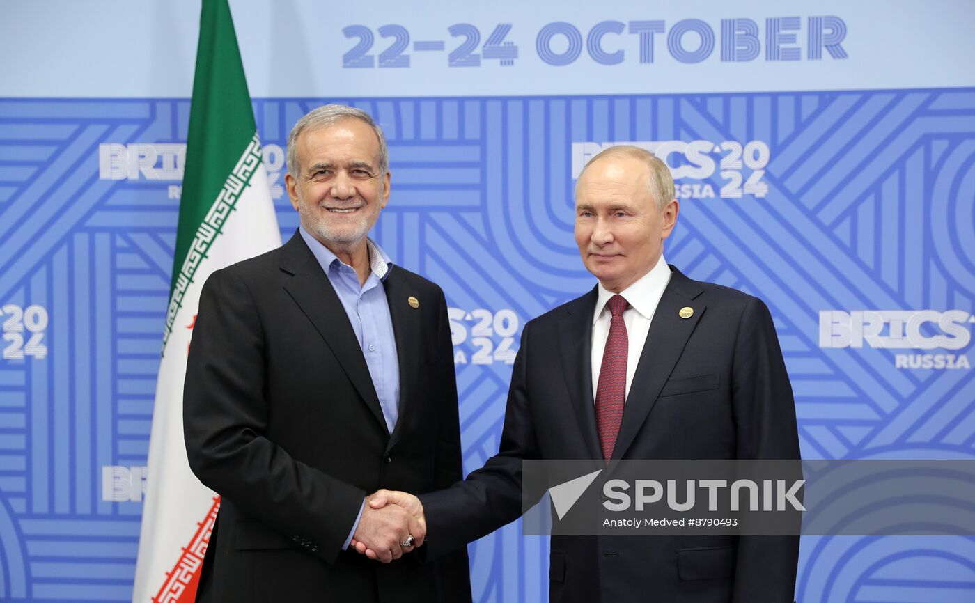 16th BRICS Summit. President of Russia Vladimir Putin meets with President of Iran Masoud Pezeshkian