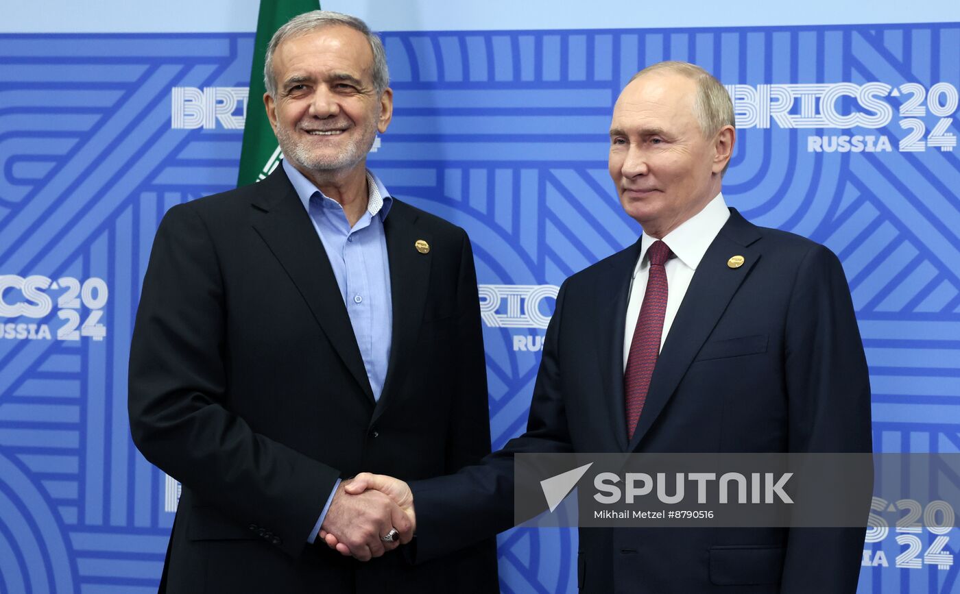 16th BRICS Summit. President of Russia Vladimir Putin meets with President of Iran Masoud Pezeshkian