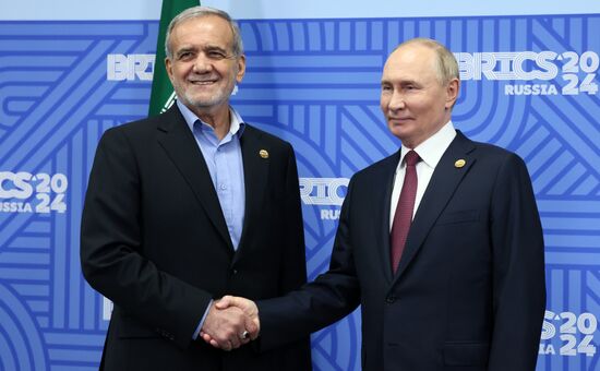 16th BRICS Summit. President of Russia Vladimir Putin meets with President of Iran Masoud Pezeshkian