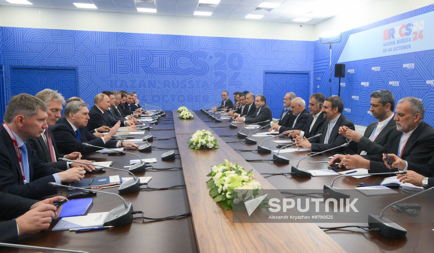 16th BRICS Summit. President of Russia Vladimir Putin meets with President of Iran Masoud Pezeshkian