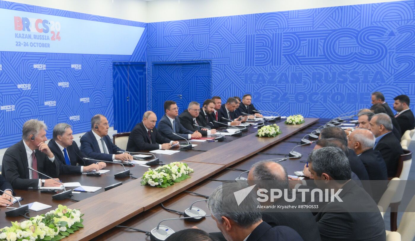 16th BRICS Summit. President of Russia Vladimir Putin meets with President of Iran Masoud Pezeshkian