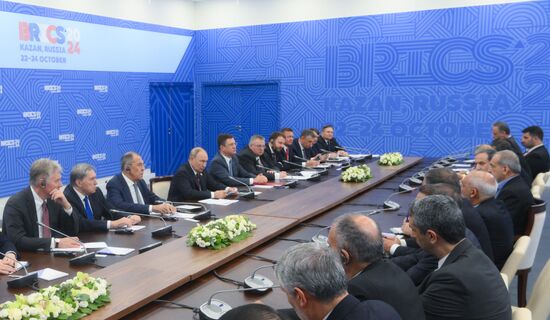 16th BRICS Summit. President of Russia Vladimir Putin meets with President of Iran Masoud Pezeshkian