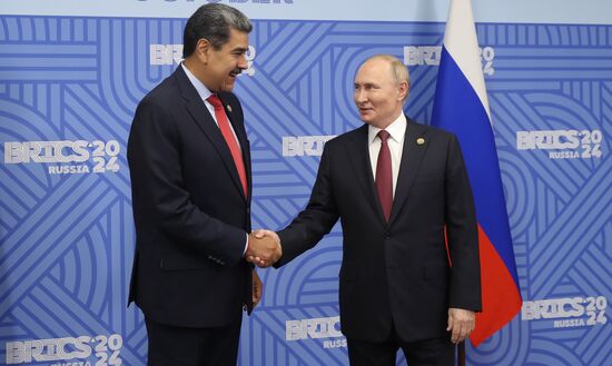 16th BRICS Summit. President of Russia Vladimir Putin meets with President of Venezuela Nicolas Maduro