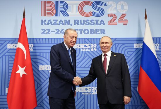 16th BRICS Summit. President of Russia Vladimir Putin meets with President of Turkiye Recep Tayyip Erdogan