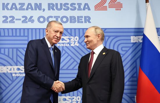 16th BRICS Summit. President of Russia Vladimir Putin meets with President of Turkiye Recep Tayyip Erdogan