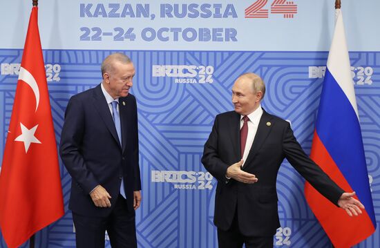 16th BRICS Summit. President of Russia Vladimir Putin meets with President of Turkiye Recep Tayyip Erdogan