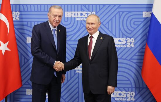 16th BRICS Summit. President of Russia Vladimir Putin meets with President of Turkiye Recep Tayyip Erdogan