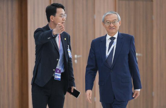 SCO Secretary-General Zhang Ming, right, during the arrival of delegations at Kazan Expo to attend the 16th BRICS summit. Location: Russia, Republic of Tatarstan, Kazan. Author: Maksim Bogodvid. 16th BRICS summit. Arrival of participants in Outreach/BRICS Plus meeting