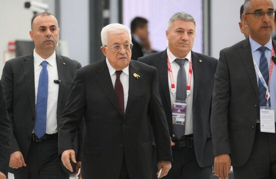 President of Palestine Mahmoud Abbas, second left, during the arrival of heads of delegation at Kazan Expo to attend the 16th BRICS summit. Location: Russia, Republic of Tatarstan, Kazan. Author: Maksim Bogodvid. 16th BRICS summit. Arrival of participants in Outreach/BRICS Plus meeting
