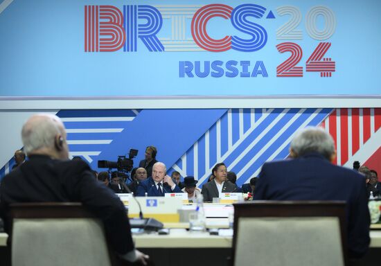 President of Belarus Alexander Lukashenko, center left, and President of Bolivia Luis Alberto Arce Catacora at the Plenary Session of the 16th BRICS Summit in the Outreach/BRICS Plus format. Location: Russia, Republic of Tatarstan, Kazan. Author: Ramil Sitdikov. 16th BRICS summit. Outreach/BRICS Plus meeting. Plenary session