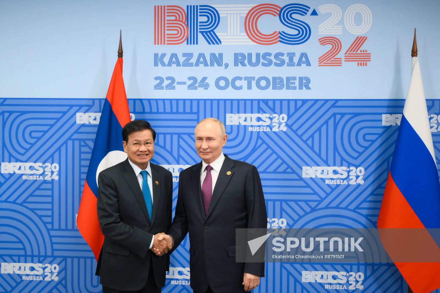 16th BRICS Summit. President of Russia Vladimir Putin meets with President of Laos Thongloun Sisoulith