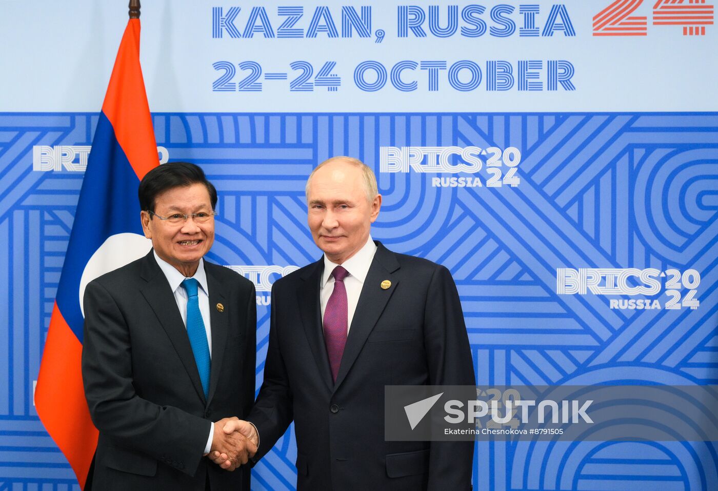 16th BRICS Summit. President of Russia Vladimir Putin meets with President of Laos Thongloun Sisoulith