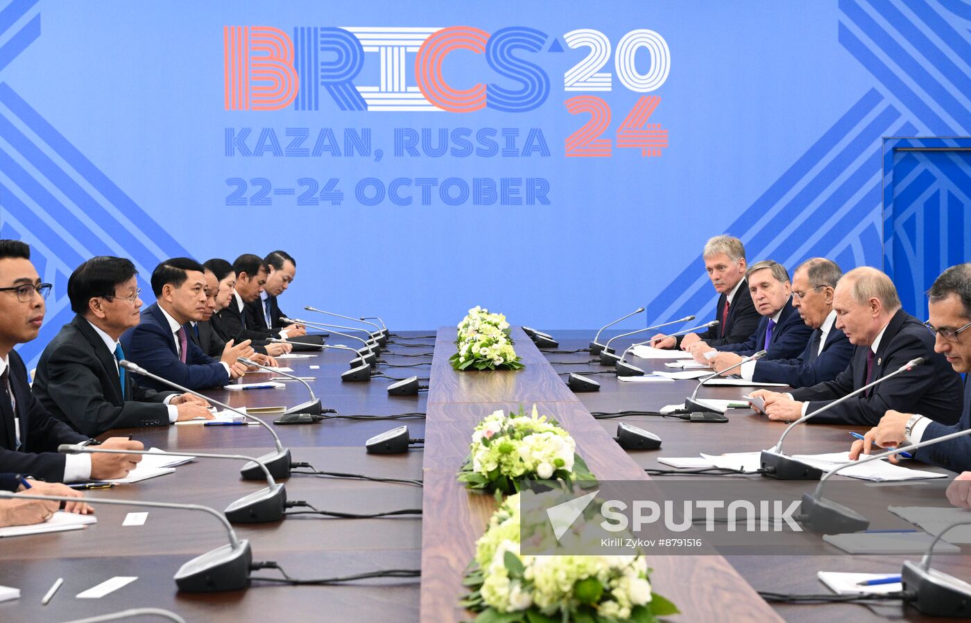 16th BRICS Summit. President of Russia Vladimir Putin meets with President of Laos Thongloun Sisoulith