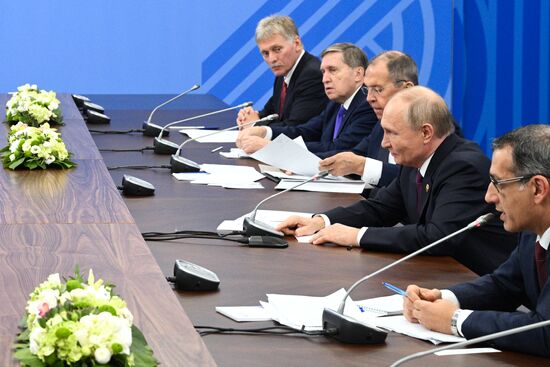 16th BRICS Summit. President of Russia Vladimir Putin meets with President of Laos Thongloun Sisoulith