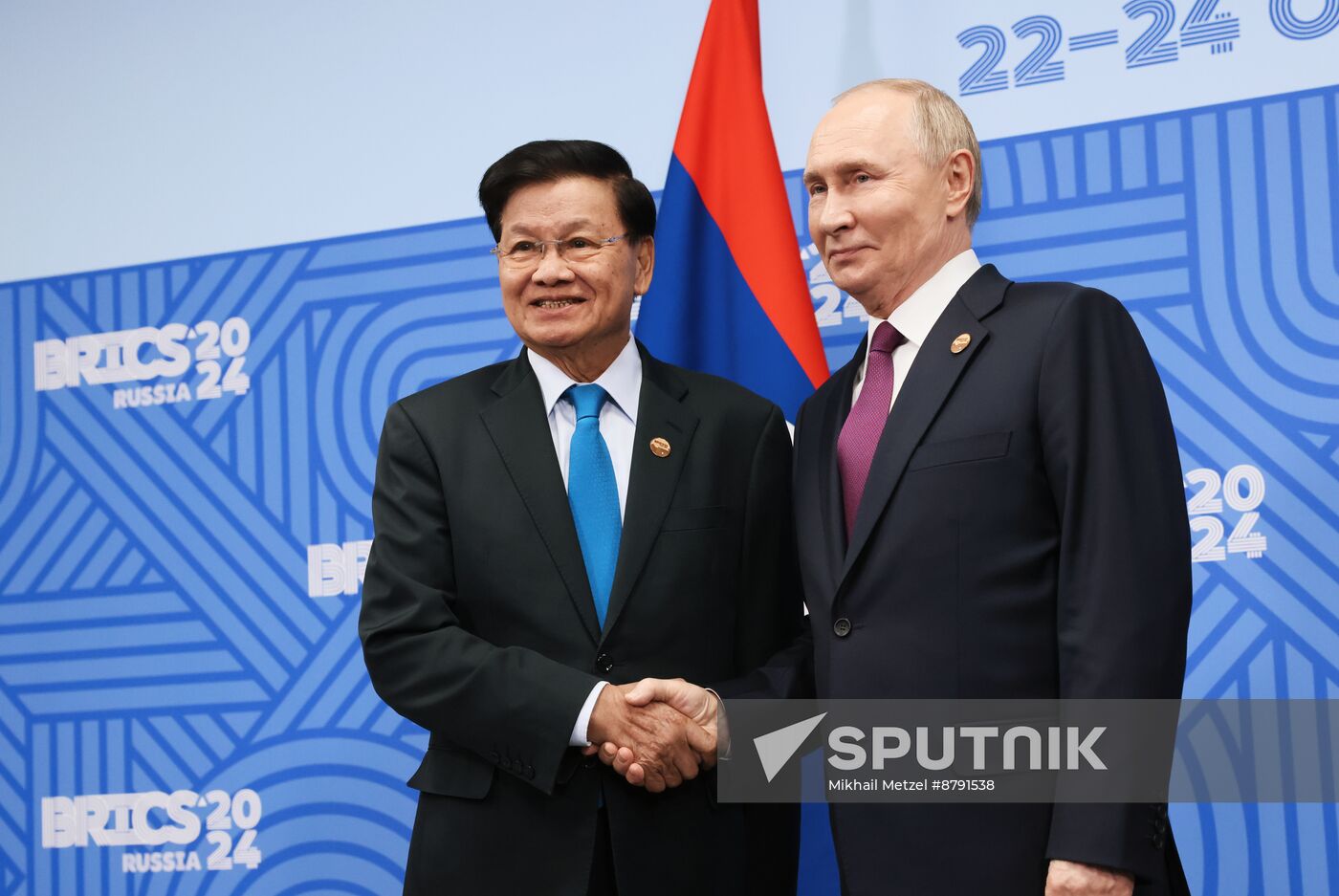 16th BRICS Summit. President of Russia Vladimir Putin meets with President of Laos Thongloun Sisoulith