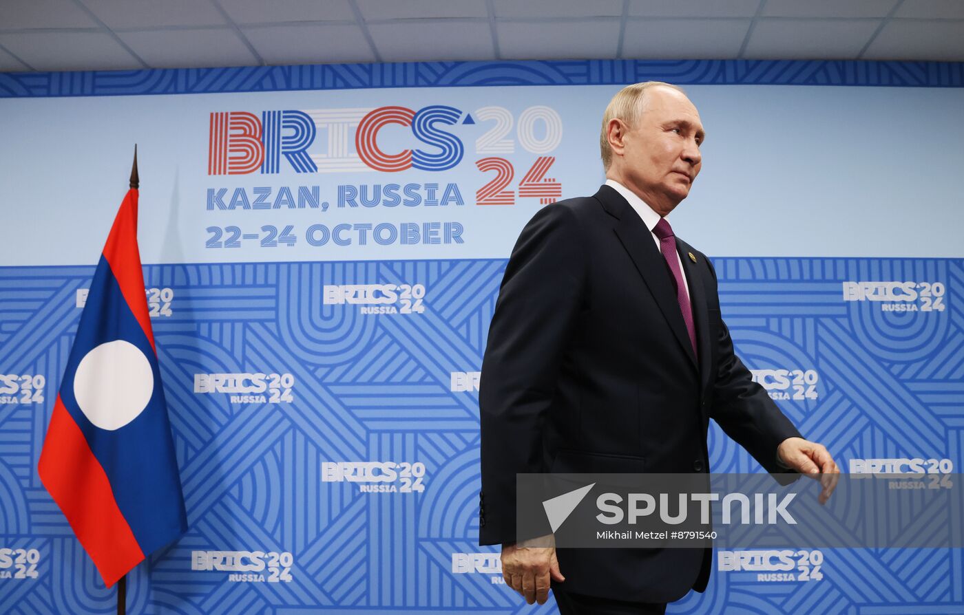 16th BRICS Summit. President of Russia Vladimir Putin meets with President of Laos Thongloun Sisoulith