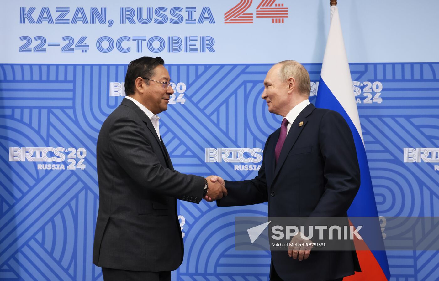 16th BRICS Summit. Meeting of President of Russia Vladimir Putin with President of Bolivia Luis Alberto Arce Catacora