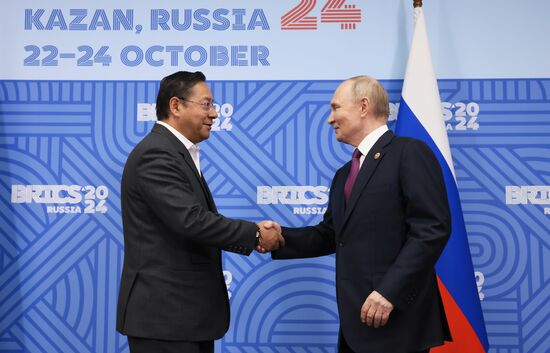 16th BRICS Summit. Meeting of President of Russia Vladimir Putin with President of Bolivia Luis Alberto Arce Catacora