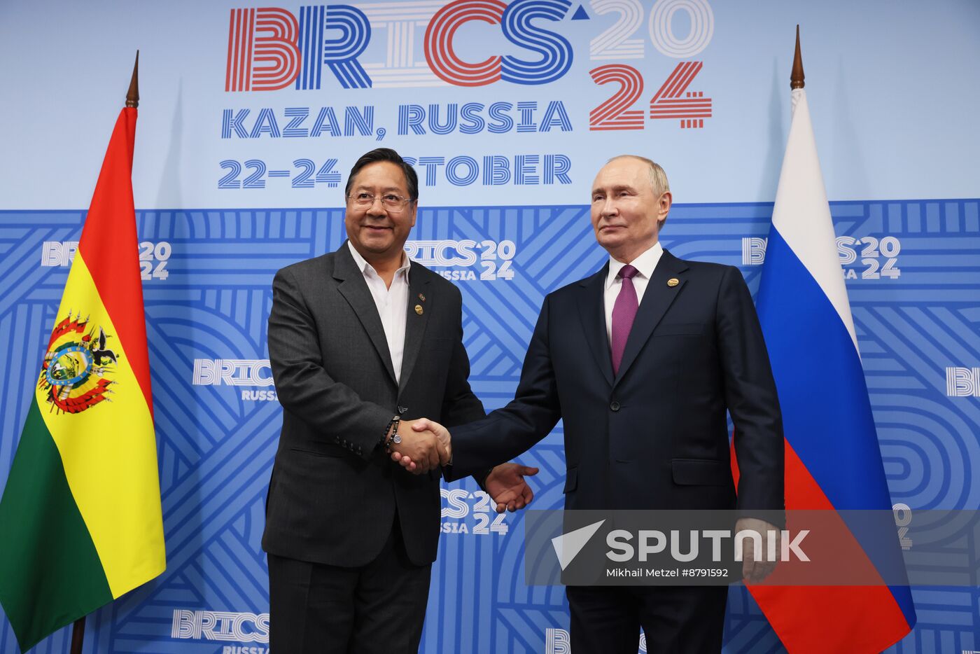 16th BRICS Summit. Meeting of President of Russia Vladimir Putin with President of Bolivia Luis Alberto Arce Catacora