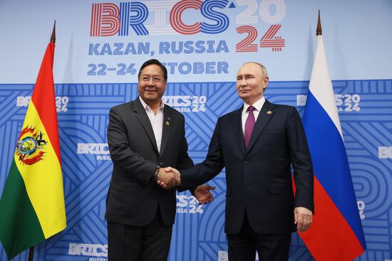 16th BRICS Summit. Meeting of President of Russia Vladimir Putin with President of Bolivia Luis Alberto Arce Catacora