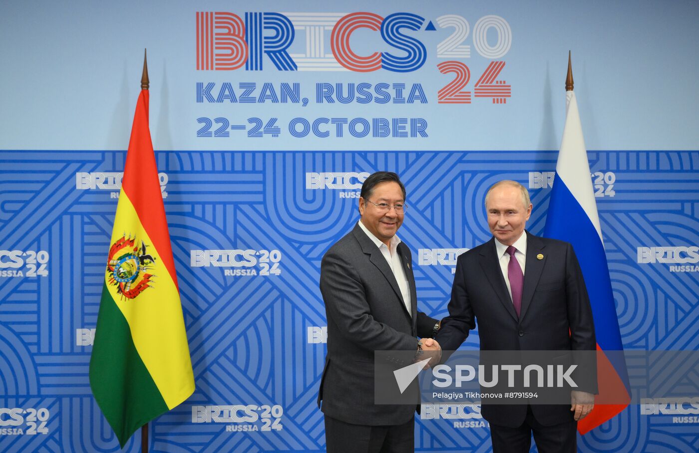 16th BRICS Summit. Meeting of President of Russia Vladimir Putin with President of Bolivia Luis Alberto Arce Catacora