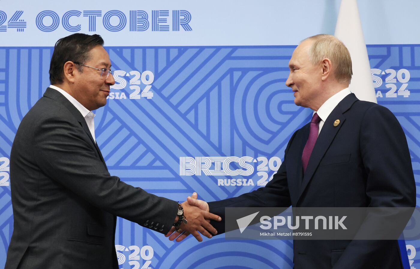 16th BRICS Summit. Meeting of President of Russia Vladimir Putin with President of Bolivia Luis Alberto Arce Catacora