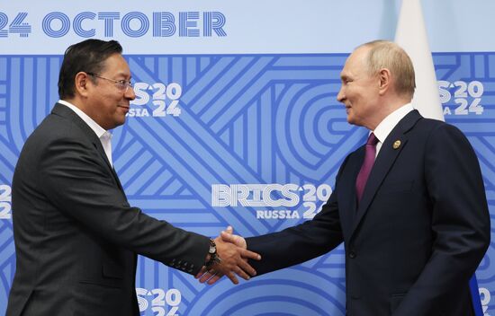16th BRICS Summit. Meeting of President of Russia Vladimir Putin with President of Bolivia Luis Alberto Arce Catacora