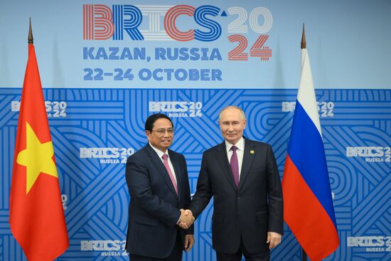 16th BRICS Summit. President of Russia Vladimir Putin meets with Prime Minister of Vietnam Phạm Minh Chinh