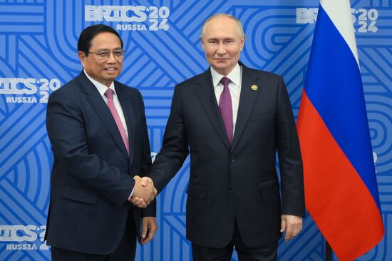 16th BRICS Summit. President of Russia Vladimir Putin meets with Prime Minister of Vietnam Phạm Minh Chinh