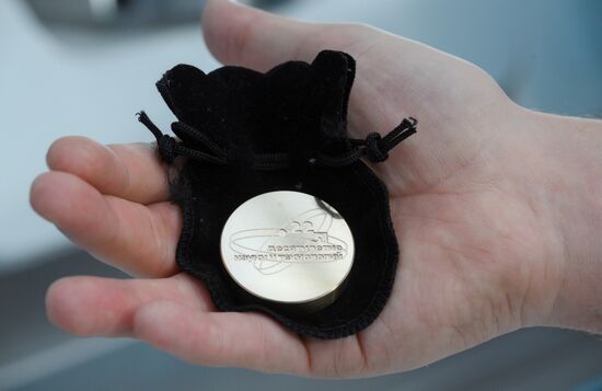 The 4th Young Scientists Congress. A brass medallion with the Decade of Science and Technology logo, made on a Beavertech milling machine. Location: Russia, Federal territory 'Sirius'. Author: Ekaterina Chesnokova. 4th Young Scientists Congress