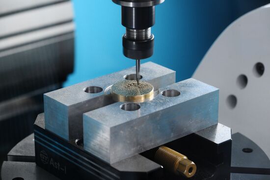 The 4th Young Scientists Congress. Engraving of a brass medallion on the Beaverteh machine at the Nasha Lab stand. Location: Russia, Federal territory 'Sirius'. Author: Ekaterina Chesnokova. 4th Young Scientists Congress