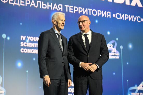 The 4th Young Scientists Congress. Plenary session. Russian Presidential Aide Andrei Fursenko and Dmitry Chernyshenko, Deputy Prime Minister of Russia. Location: Russia, Federal territory 'Sirius'. Author: Ilya Pitalev. 4th Young Scientists Congress. Plenary session