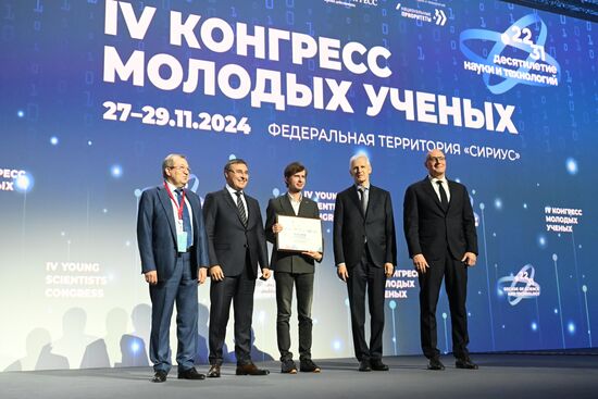 The 4th Young Scientists Congress. Plenary session. Winners of the BRICS Contest of Young Innovators announced. Award ceremony. From left: Gennady Krasnikov, President of the Russian Academy of Sciences; Valery Falkov, Minister of Science and Higher Education of the Russian Federation; Dmitry Shadrin, innovator, Russia Andrei Fursenko, Aide to the President of the Russian Federation; Dmitry Chernyshenko, Deputy Prime Minister of the Russian Federation. Location: Russia, Federal territory 'Sirius'. Author: Ilya Pitalev. 4th Young Scientists Congress. Plenary session
