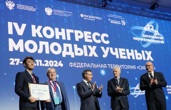The 4th Young Scientists Congress. Plenary session. Winners of the BRICS Contest of Young Innovators announced. Award ceremony. From left: Xin Cai, winner of the BRICS Young Innovator Prize, China; Gennady Krasnikov, President of the Russian Academy of Sciences; Valery Falkov, Minister of Science and Higher Education of the Russian Federation; Andrei Fursenko, Aide to the President of the Russian Federation; Dmitry Chernyshenko, Deputy Prime Minister of the Russian Federation. Location: Russia, Federal territory 'Sirius'. Author: Alexander Vilf. 4th Young Scientists Congress. Plenary session
