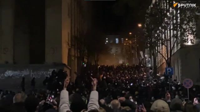 Riot police is using water cannons to disperse anti-government protesters in central Tbilisi