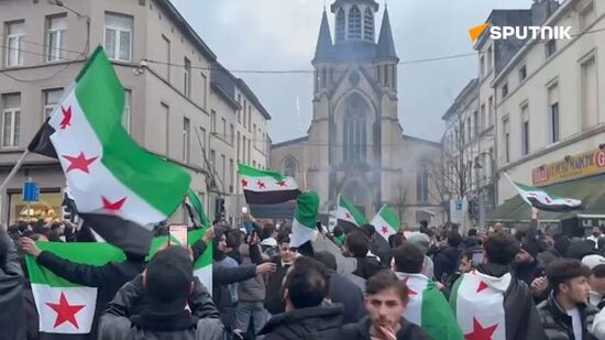 Thousands of Syrians living in Brussels take to the streets