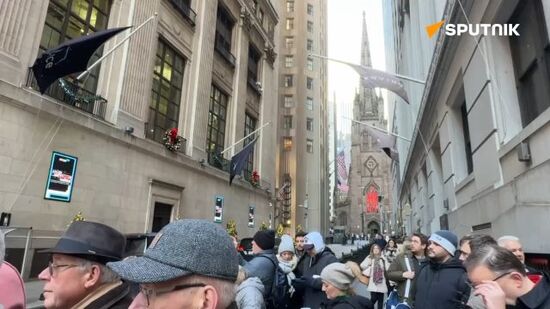 A crowd gathers outside the New York Stock Exchange