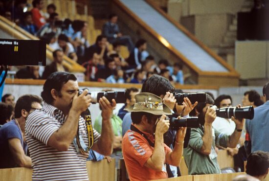 Photo correspondents working during volleyball tournament