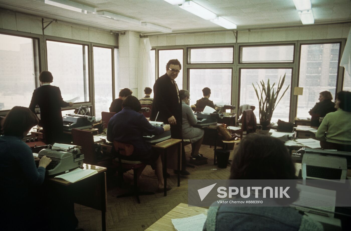 Technical editors work at typing office