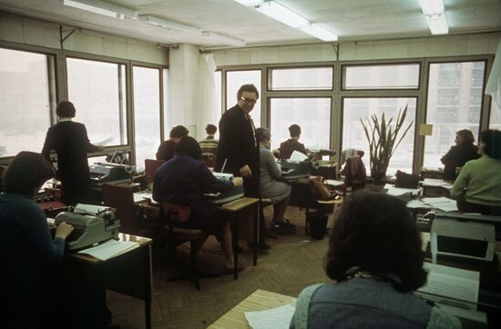 Technical editors work at typing office