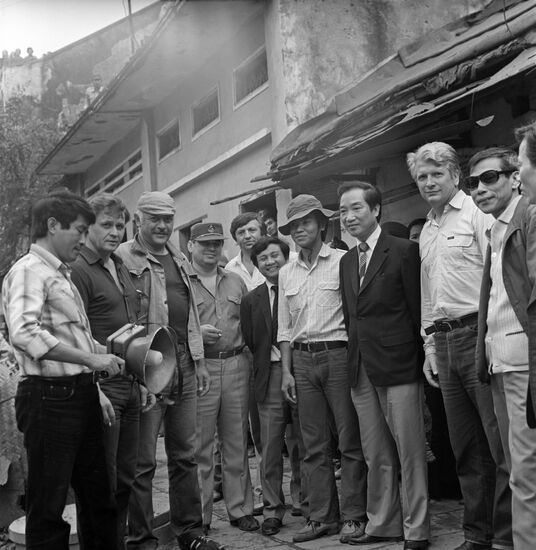 Actors and crew on set of film Coordinates of Death