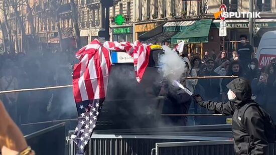 Sputnik. The Paris police are firing tear gas and attacking protesters with batons at a student rally against cuts in the public sector and against US-imposed tariffs