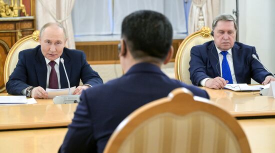 May 7, 2025. President of Russia Vladimir Putin and Presidential Aide Yury Ushakov, right, during their meeting with President of Mongolia Ukhnaagiin Khurelsukh. Location: Russia, Moscow. Author: Alexey Nikolskiy/Sputnik. President of Russia Vladimir Putin meets with President of Mongolia Ukhnaagiin Khurelsukh