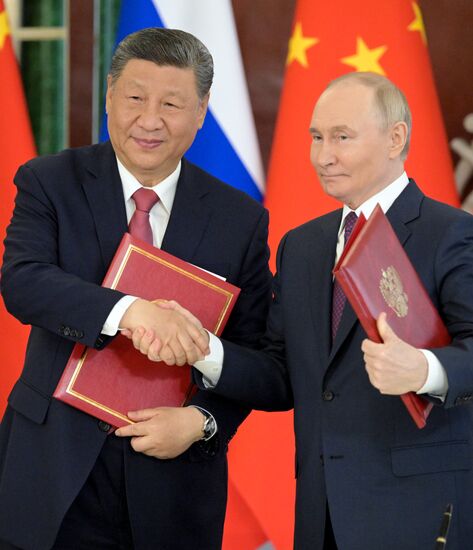 May 8, 2025. President of Russia Vladimir Putin and President of China Xi Jinping, left, during a ceremony of exchanging documents after Russia-China talks. Location: Russia, Moscow. Author: Alexey Nikolskiy/Sputnik. President of China Xi Jinping's official visit to Russia