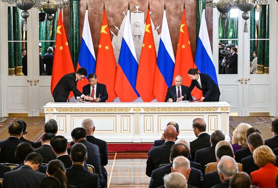 May 8, 2025. President of Russia Vladimir Putin and President of China Xi Jinping during a ceremony of exchanging documents after Russia-China talks. Location: Russia, Moscow. Author: Sergey Bobylev/Sputnik. President of China Xi Jinping's official visit to Russia
