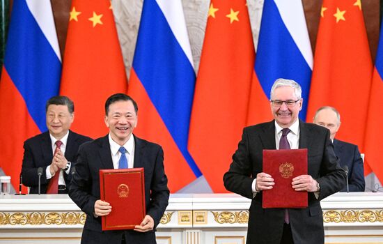 May 8, 2025. VGTRK Director General Oleg Dobrodeyev and China Media Corporation Director General Shen Haixiong, right, at a ceremony of exchanging documents after Russia-China talks. Location: Russia, Moscow. Author: Sergey Bobylev/Sputnik. President of China Xi Jinping's official visit to Russia