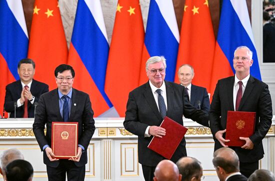 May 8, 2025. Right: Kirill Dmitriev, CEO of the Russian Direct Investment Fund (RDIF), Special Presidential Representative for Investment and Economic Cooperation with Foreign Countries; and Anatoly Torkunov, Rector of the Moscow State Institute of International Relations (MGIMO Univeristy), center, at the ceremony of exchanging documents following Russia-China talks. Location: Russia, Moscow. Author: Sergey Bobylev/Sputnik. President of China Xi Jinping's official visit to Russia